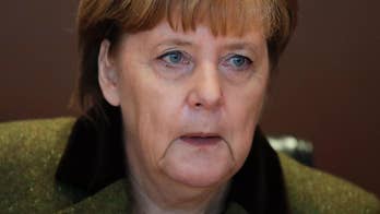 Germany takes G-20 chair, Merkel condemns protectionism