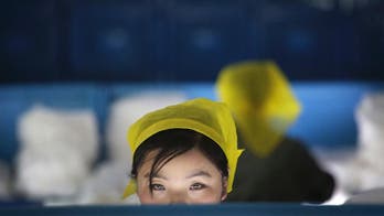 Silk, steam and slogans: Inside a North Korean factory