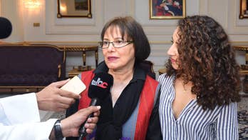 Canadian-Iranian professor held in Iran returns to Canada