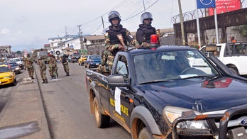 Sierra Leone troops enforce Ebola quarantines, Liberia declares emergency