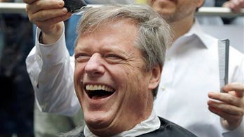 Massachusetts governor gets head shaved to support charity