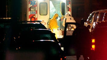 Extreme measures: U.S. hospitals take on Ebola, but at what risk?