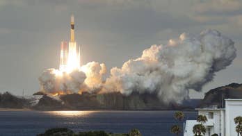 Japan's military launches first communications satellite