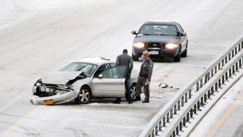 The Latest: Police say man pulls unloaded gun on snow plow driver during road rage incident