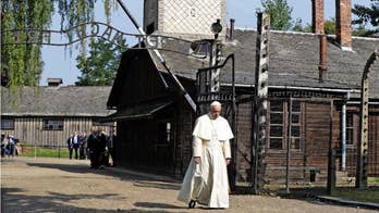 Pope visits Auschwitz in silence, meets survivors