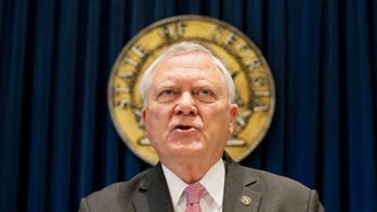 Two Republican governors, two different calculations