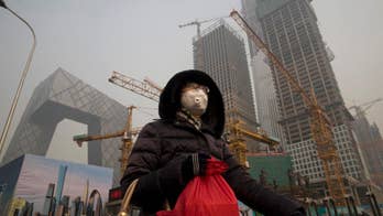 Choked by smog, Beijing creates new environmental police