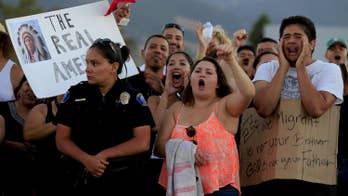 Protesters in Murrieta block detainees' buses in tense standoff