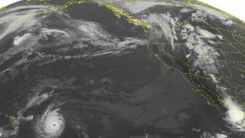 The Latest: Hurricane watch area reduced in Hawaii