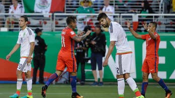 Vargas scores 4 goals, defending champ Chile routs Mexico