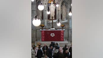 Queen gifts home-made altar hanging to famed Lutheran church