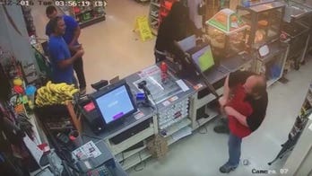 7-Eleven clerk caught on video disarming shotgun-wielding would-be robber