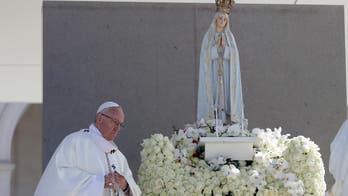 The Latest: Pope Francis prays at Fatima basilica