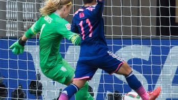 Defending World Cup champion Japan beats the Netherlands 2-1 to reach Saturday quarterfinal