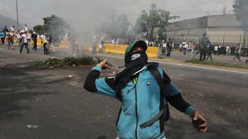 The Latest: Venezuelans gear up for opposition march