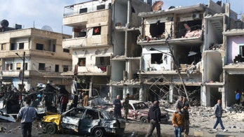 At least 130 dead after blasts rock Syrian cities