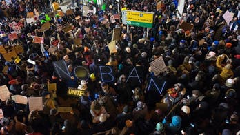 Protests erupt at airports following Trump travel ban