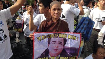 Vietnam dissident Le Quoc Quan jailed for tax evasion