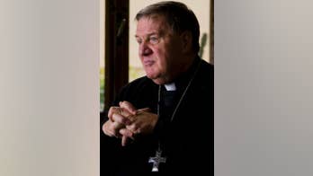 US cardinal sees challenging 4 years with Trump on refugees