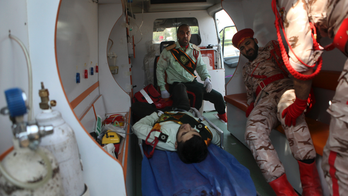 The Latest: Iran says US ally behind military parade attack