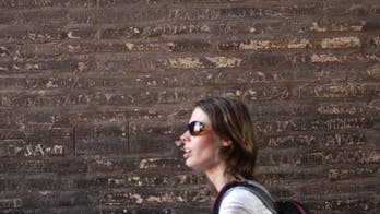 Ecuadoran tourist cited for writing names on Roman Colosseum