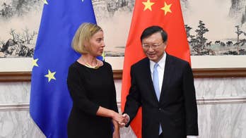 China, EU push message of free trade, engagement
