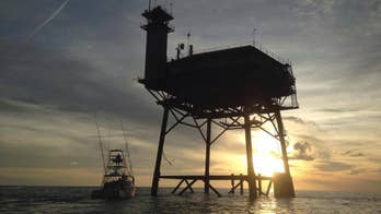 Say what? Owner of tower rides out storm in middle of ocean