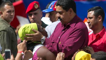 Talks begin between Venezuela's government and opposition