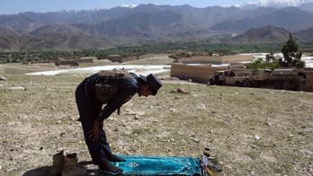Afghan official: massive US bomb dead toll rise to 94