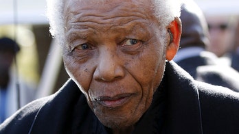 Nelson Mandela remains hospitalized on Christmas but condition improving