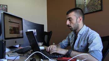 Syrian journalists cover civil war at home from Jordan exile