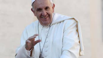 Pope Francis gets Cubs hat, baseball from Chicago archbishop