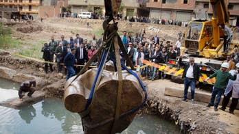 Second part of ancient Egyptian statue lifted from site