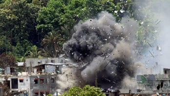 Philippine troops evict Muslim rebel raiders from village