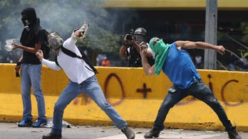 Venezuela protesters target Maduro, vow to keep up pressure
