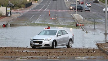 Storm sweeps through Vegas, swamping roads, stranding people