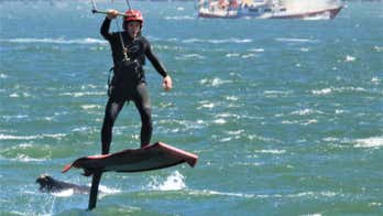 California kite surfer narrowly misses humpback whale while riding waves near Golden Gate Bridge