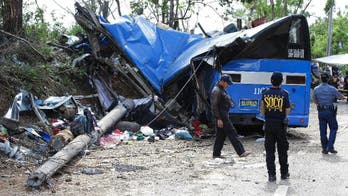 At least 14 killed in Philippine bus crash
