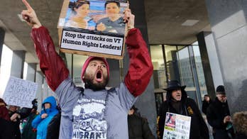 About 100 protest detention of Vermont farm worker advocates