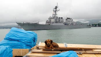 US warship fires warning shots at Iranian boats
