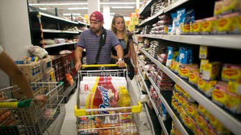Middle class Venezuelans liquidate savings to buy food