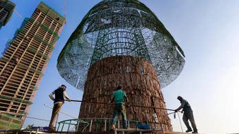 Sri Lankans rush to build towering Christmas tree on time