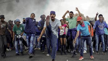 Rioters and police clash in Johannesburg protest