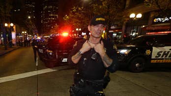 The Latest: Police searching for gunman in Seattle shooting