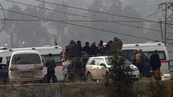 The Latest: Buses leave 2 Syrian villages under Aleppo deal