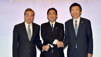 FMs from Japan, China, SKorea meet, slam NKorea missile
