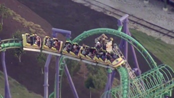Officials rescue over a dozen people stuck on Six Flags roller coaster in Maryland