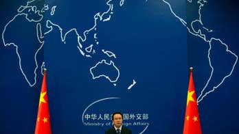 China says it's entitled to watch over islands, following reported exchange with US surveillance plane