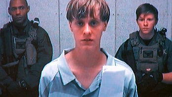 Accused South Carolina church shooter Dylann Roof fires lawyers, to face judge