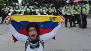 Rival marches in Venezuela to oppose, back government